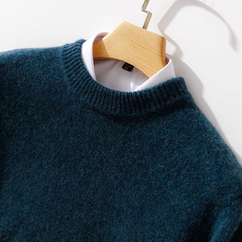 Thick Natural Wool Sweater With Elastic Hem in a rich blue color, perfect for stylish winter wear