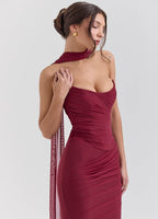 Elegant three-piece mermaid style dress in burgundy showcasing a fitted silhouette and shoulder scarf