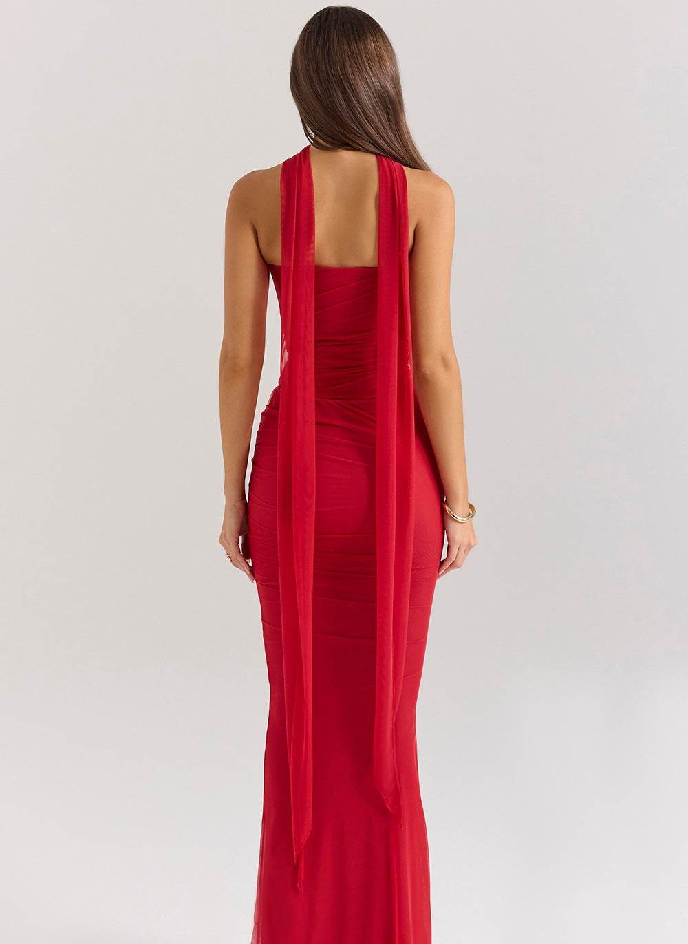 Elegant back view of a Three-Piece Mermaid Style Dress in red, showcasing its flattering silhouette and unique design