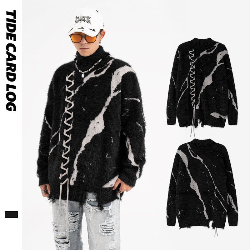 Oversized Sweater With Dark Street Design And Distressed Details featuring a stylish black and white pattern
