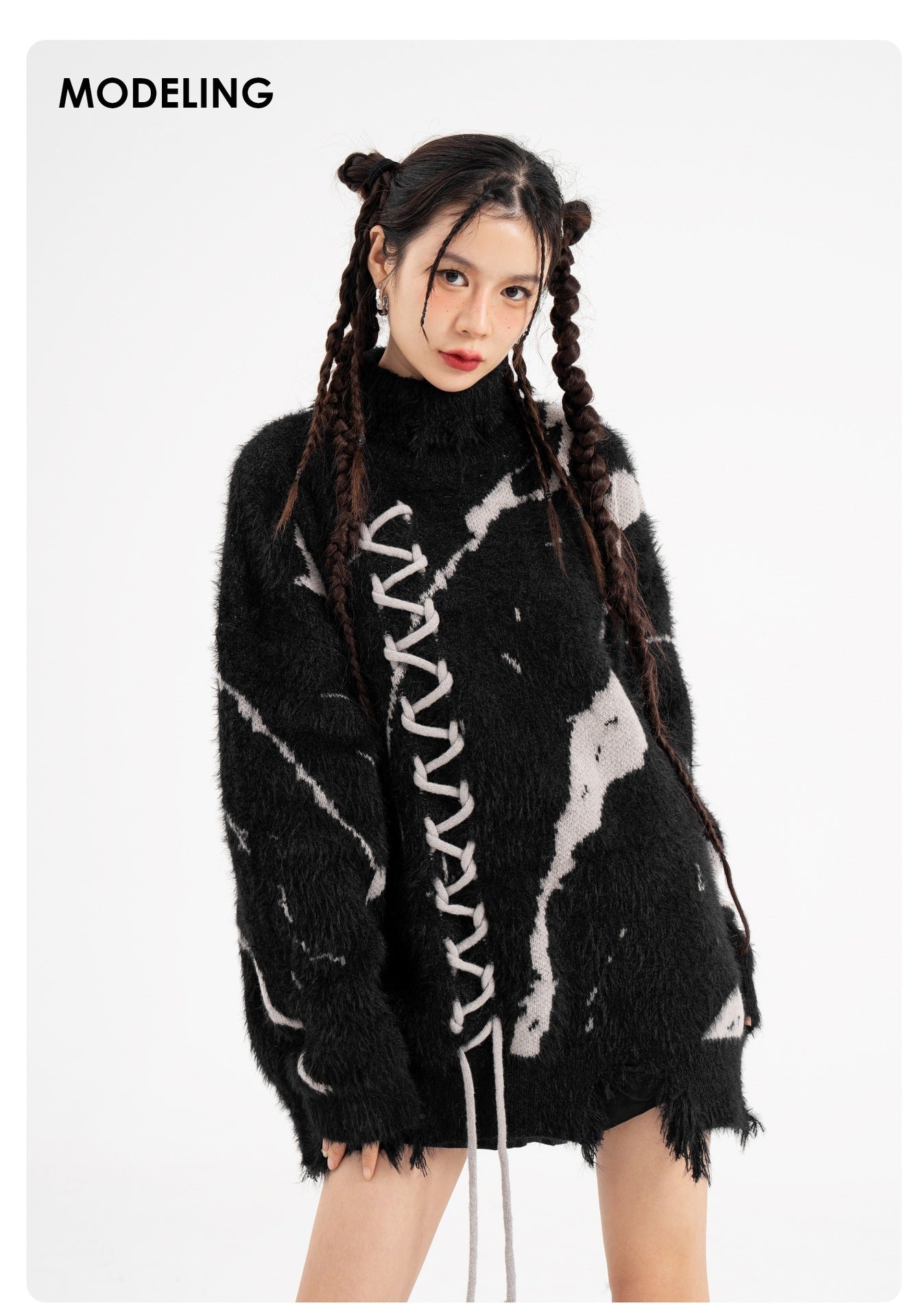 Oversized Sweater With Dark Street Design And Distressed Details modeled by a young woman with unique hairstyle