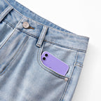 Close-up of AM Vision RO Twin Blossom Wide Leg Jeans with a phone in the front pocket