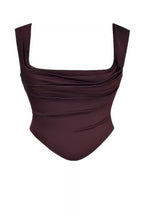 Stylish Two-Piece Skirt and Top Set featuring a fitted square neckline top in dark burgundy
