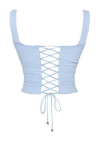 Light blue AM Vision RO Two-Piece Skirt and Top Set featuring a stylish lace-up front design