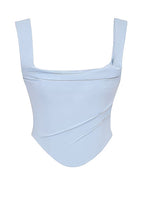 Light blue top from the Two-Piece Skirt and Top Set featuring a stylish square neckline