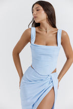 Light Blue Two-Piece Skirt and Top Set with Elegant Draping and Modern Design