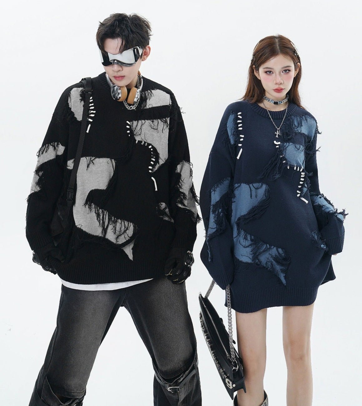 Models wearing Unisex Streetwear Sweater With Irregular Pattern And Fringe Details in black and navy colors