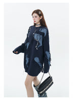 Model wearing a Unisex Streetwear Sweater With Irregular Pattern And Fringe Details, styled with accessories
