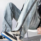 Men's versatile urban jeans with side zippers for custom styling and casual streetwear look