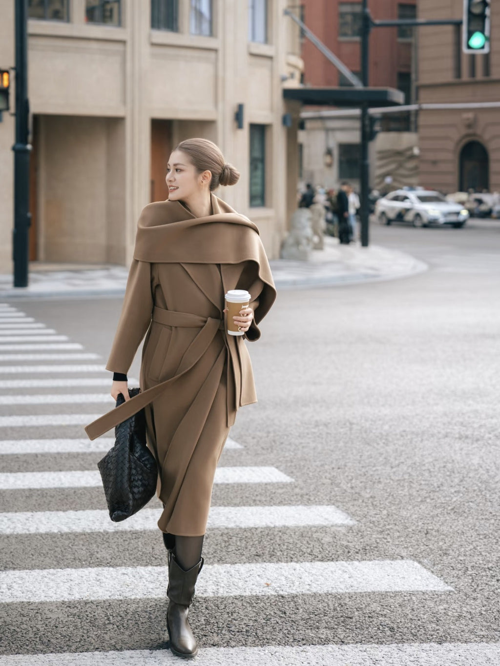 Stylish woman crossing the street wearing Urban Drift Double Face Wool Scarf Coat Camel and Caramel Edition