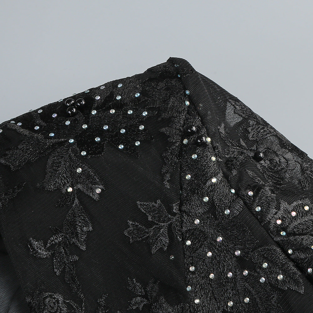 Close-up of the Valentina Crystal Lace V-Neck Jumpsuit showcasing intricate beading and floral lace details