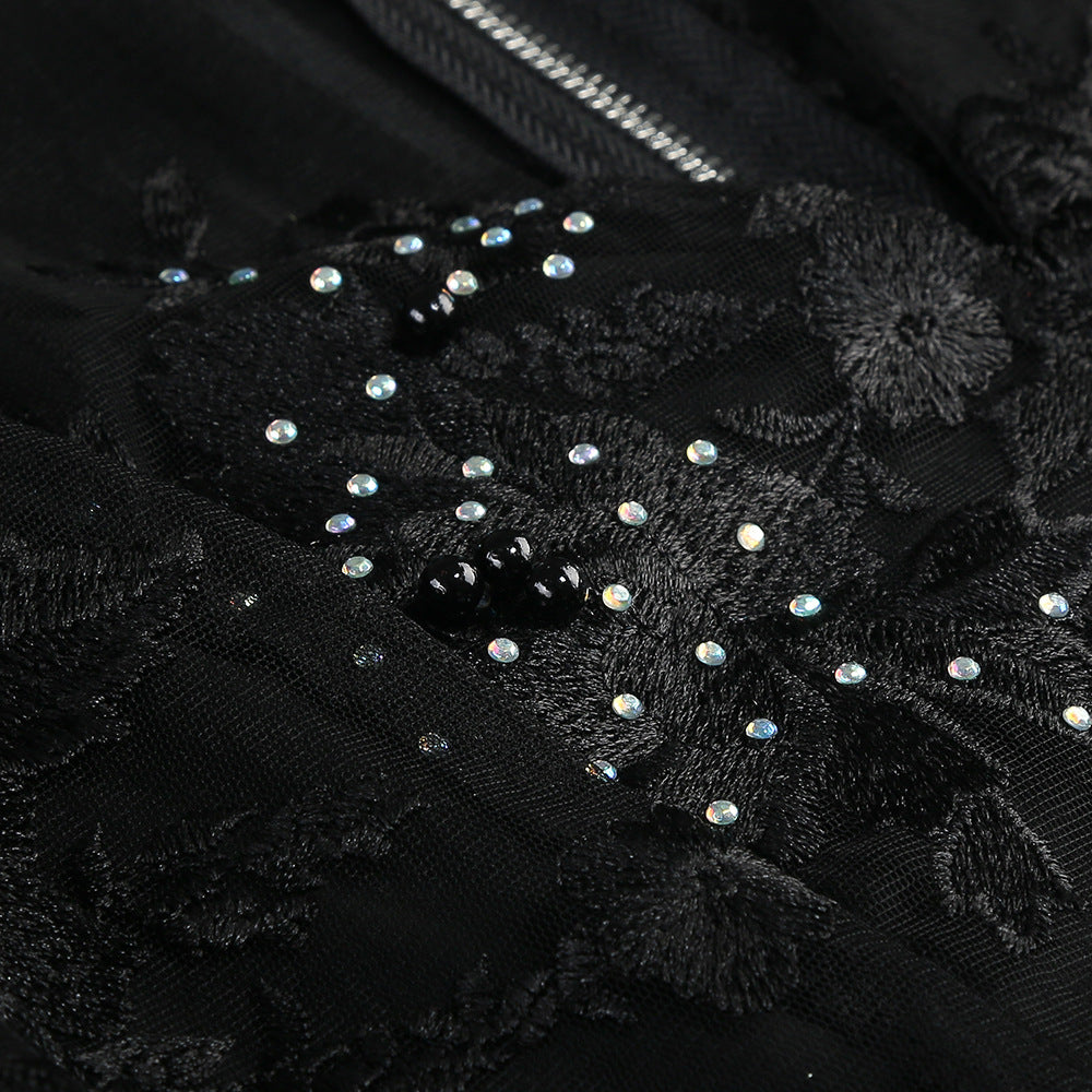 Valentina Crystal Lace V-Neck Jumpsuit featuring intricate lace and sparkling crystals for an elegant look