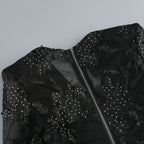 Valentina Crystal Lace V-Neck Jumpsuit featuring intricate lace design and sparkling crystals