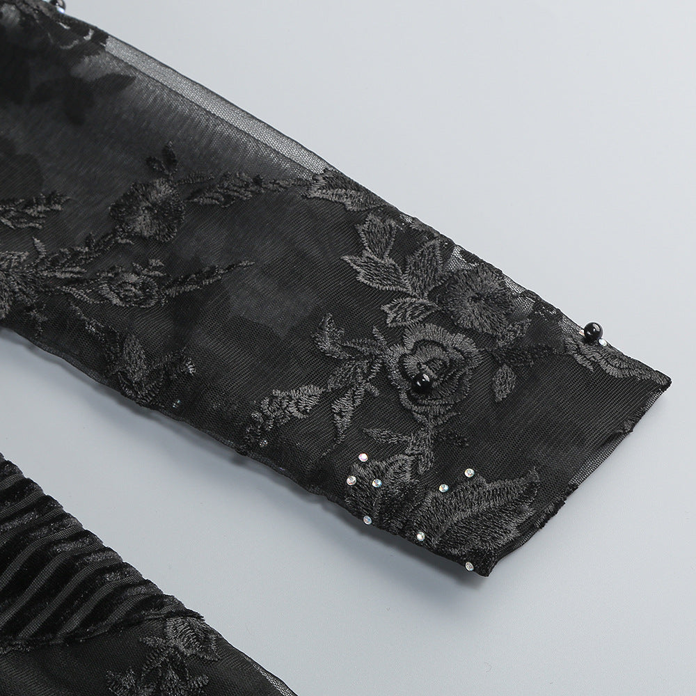 Close-up of Valentina Crystal Lace V-Neck Jumpsuit detailing with floral lace and elegant embellishments