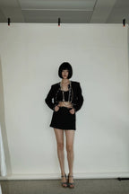 Valeria Tweed Set Jacket, Bra, Skirt in Black with Chain Details for a Stylish Look
