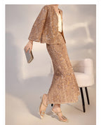Camel midi skirt with geometric sequins styled with a matching top and accessories for a chic look