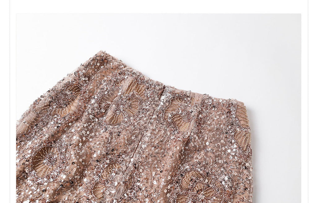 Camel midi skirt with geometric sequins showcasing intricate detailing and stylish design