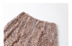 Camel midi skirt with geometric sequins showcasing intricate detailing and stylish design