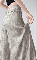 Casual Wide-Leg Pants in a soft beige fabric with a high-waisted design and sleek silhouette