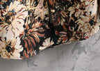 Osaka Breeze Floral Shirt Jacket featuring a colorful floral pattern on a textured fabric
