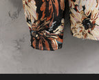 Osaka Breeze Floral Shirt Jacket featuring vibrant floral patterns and rolled cuff design