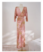 Elegant Pink Silk Blossom Dress with flowy sleeves and a wrap design, ideal for special occasions