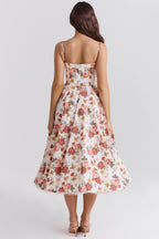 Back view of a floral Satin Midi Dress by AM Vision RO with a flared skirt and adjustable straps