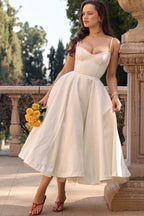 Elegant white Satin Midi Dress with a fitted bodice and flared skirt, perfect for special occasions