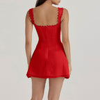 Back view of red short casual dress with scalloped straps and a fitted bodice from AM Vision RO