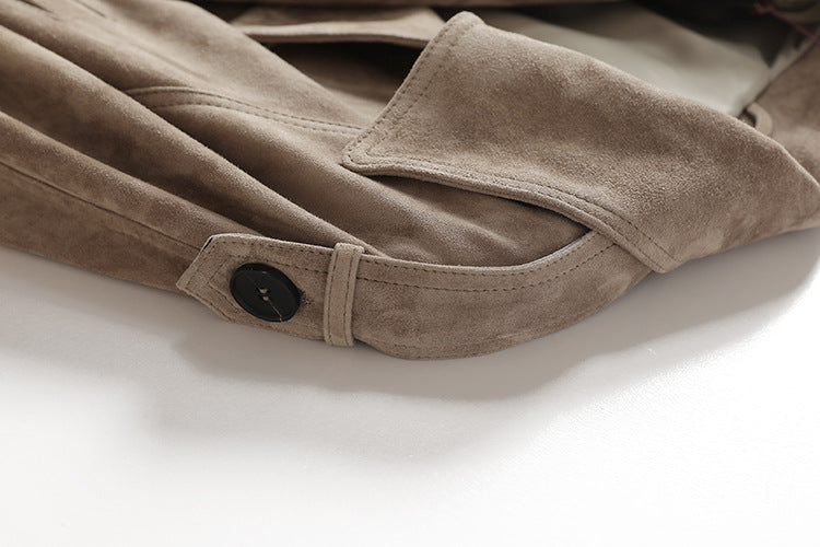 Close-up of a Vintage Belted Shearling Suede Jacket showcasing soft suede texture and button details