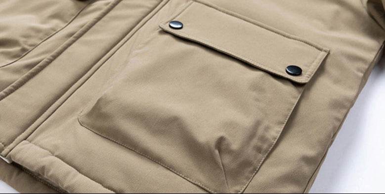 Close-up of AM Vision RO Warm Jacket with Multiple Pockets in beige color, featuring secure snap closures.