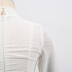 Close-up of a White Dress With 3D Flowers And Voluminous Skirt showcasing texture and design details