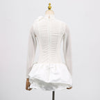 Back view of the White Dress With 3D Flowers And Voluminous Skirt, showcasing elegant details and design