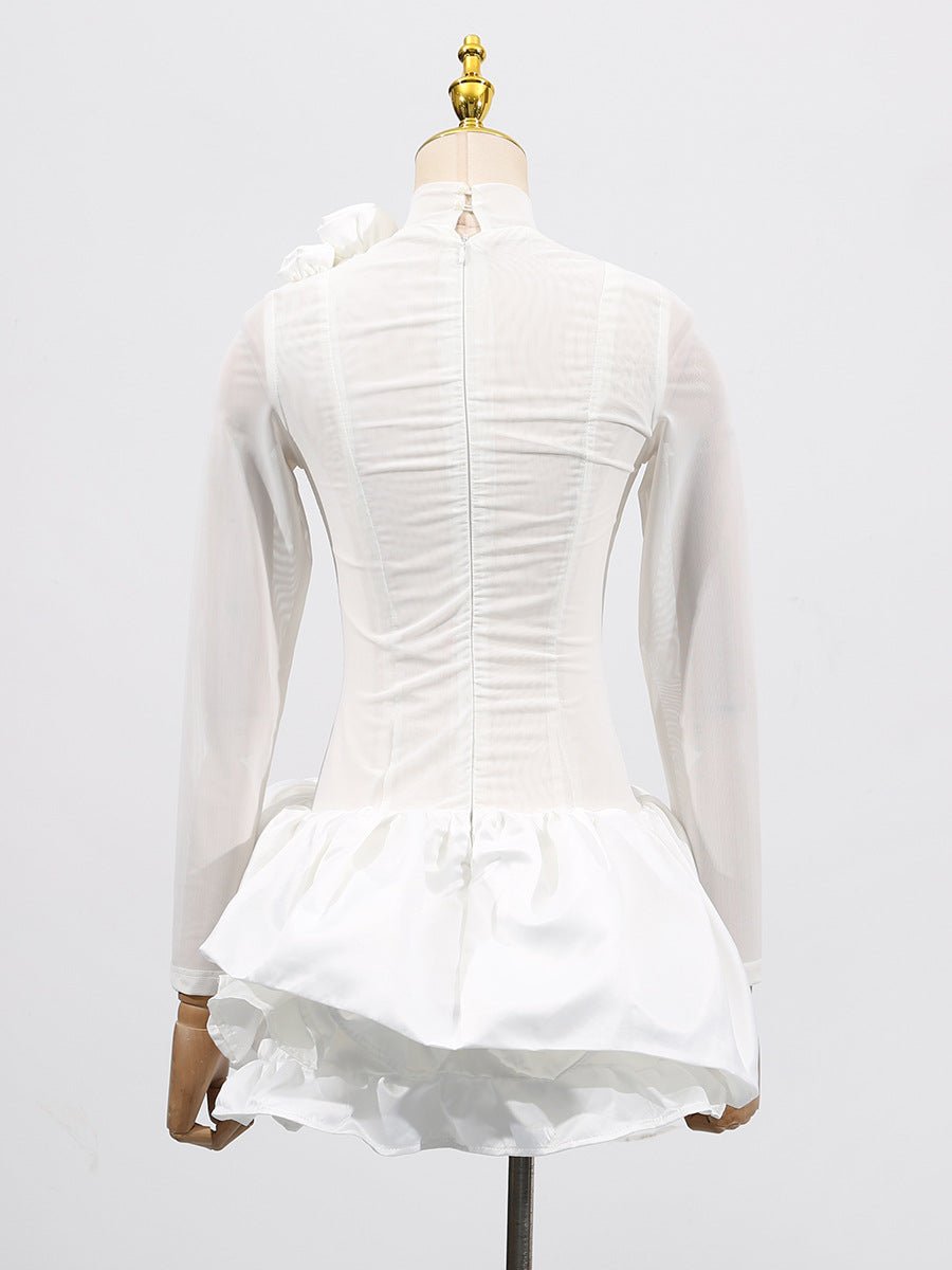 Back view of a White Dress With 3D Flowers And Voluminous Skirt showcasing elegant design details