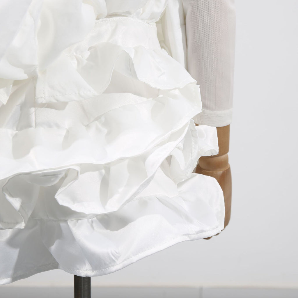 Elegant White Dress With 3D Flowers And Voluminous Skirt, showcasing layered ruffles and intricate floral details