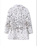 Back view of a White Luxe Lynx Coat in a stylish faux fur design featuring a soft texture