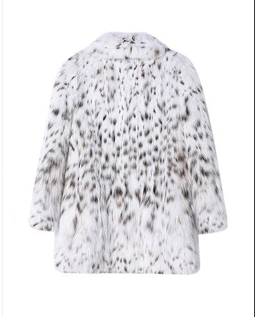 Back view of a White Luxe Lynx Coat in a stylish faux fur design featuring a soft texture