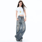 Fashion model wearing Wide Jeans with 3D CHAINS Print, styled with a white top and accessories