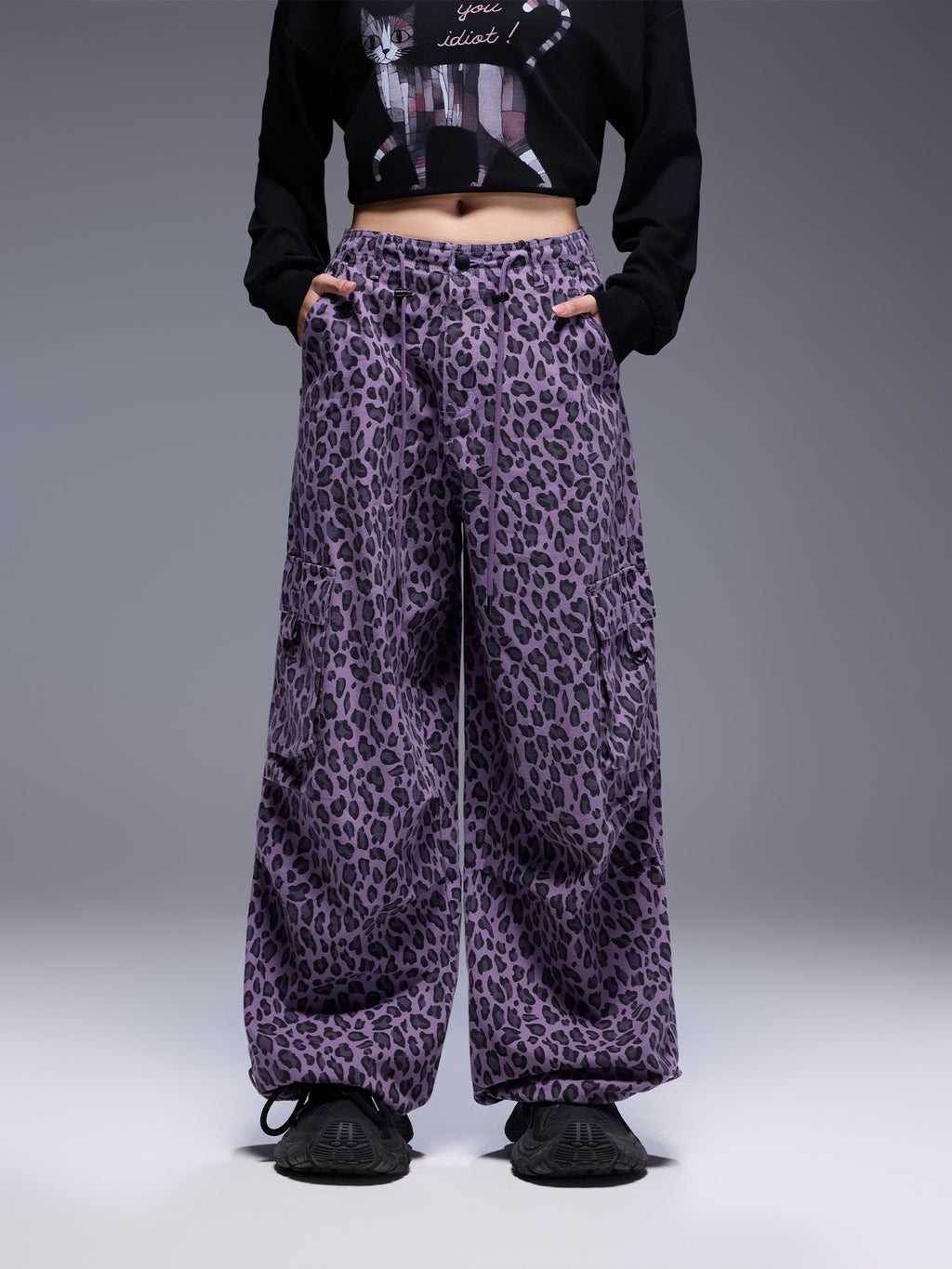 Wild Urban Leopard Cargo Pants in purple with a relaxed fit and pockets for stylish streetwear