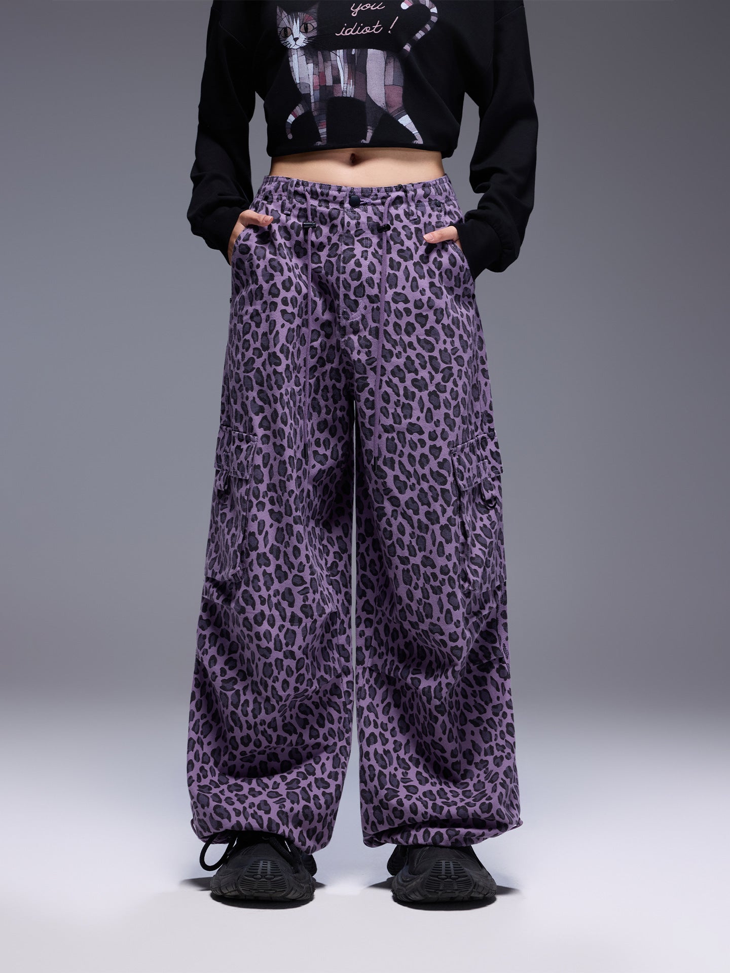 Wild Urban Leopard Cargo Pants in purple with a relaxed fit and pockets for stylish streetwear