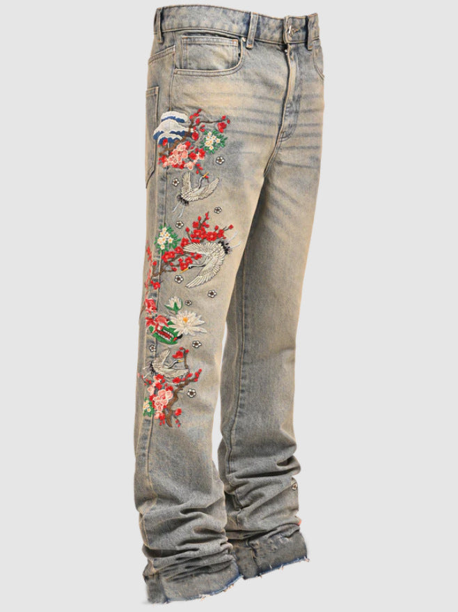 AM Vision RO Wildflight Embroidered Jeans featuring colorful floral embroidery on a faded denim background
