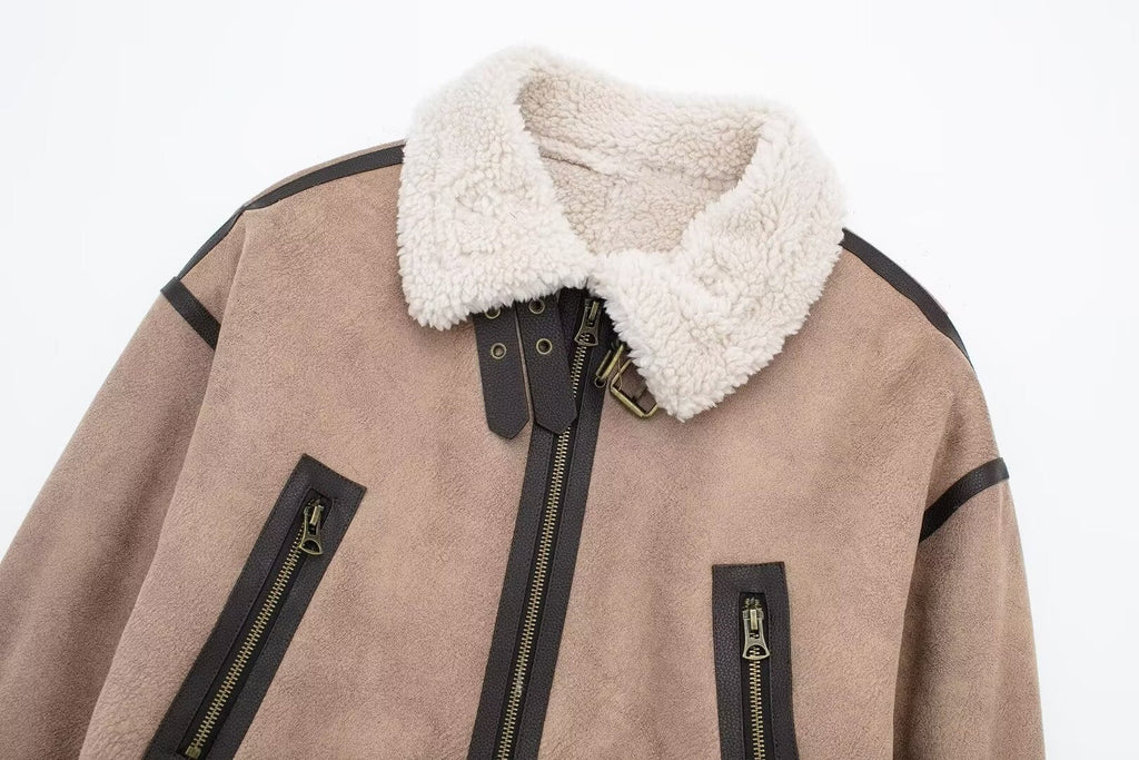 Women Retro Motorcycle Style Short Fur Jacket with a cozy collar and zippered pockets