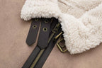 Close-up of the zipper detail on a Women Retro Motorcycle Style Short Fur Jacket showcasing the soft lining