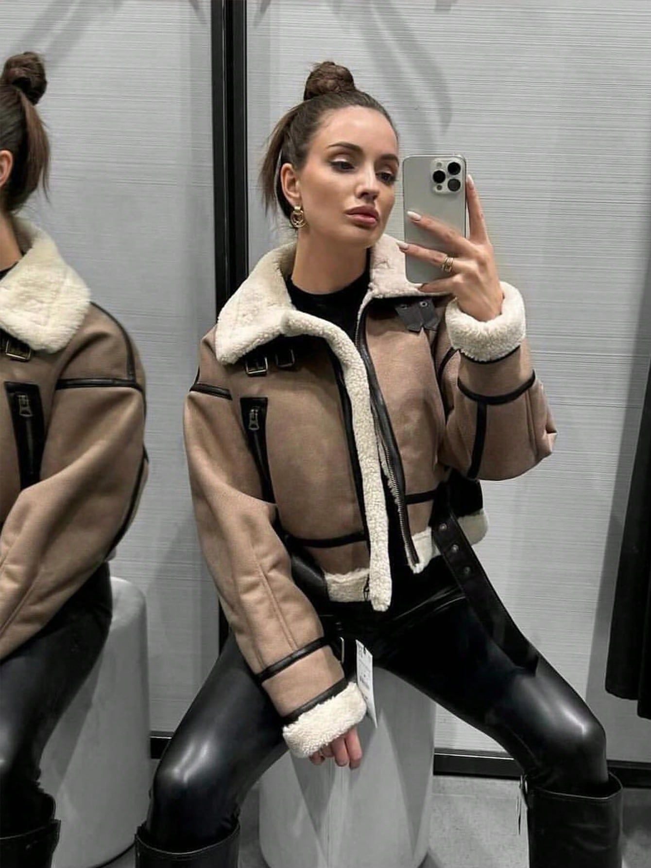 Women Retro Motorcycle Style Short Fur Jacket in brown with contrasting black details and cozy lining