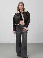 Women Retro Motorcycle Style Short Fur Jacket with a stylish black crop top and gray wide-leg pants
