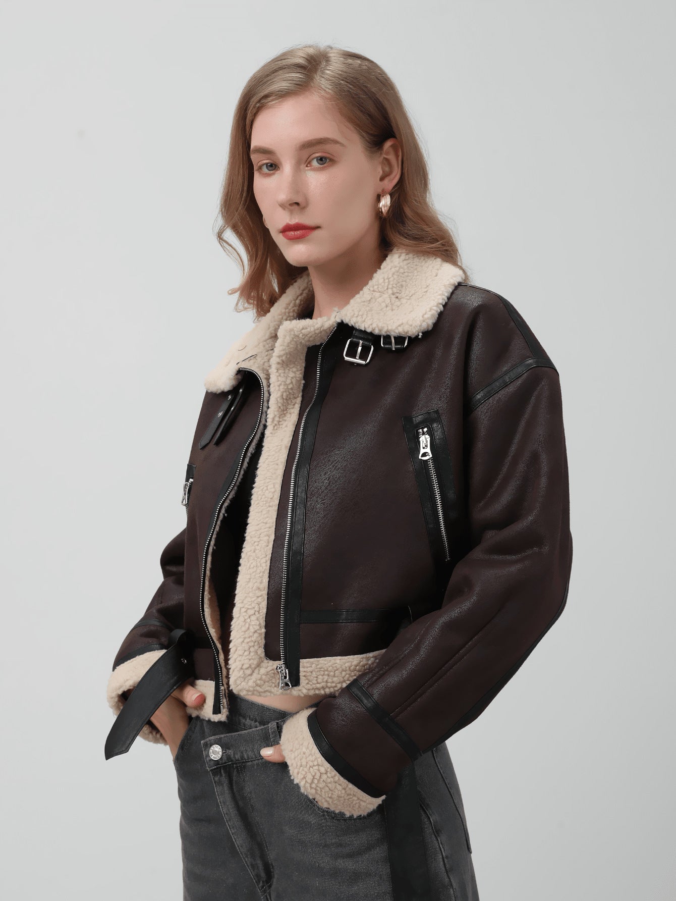 Women Retro Motorcycle Style Short Fur Jacket with a brown leather finish and plush collar detail