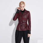 Women's wine leather moto jacket featuring a belted waist and stylish zippered pockets