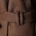 Close-up of a brown AM Vision RO wool jacket featuring a belted waist for a stylish fit