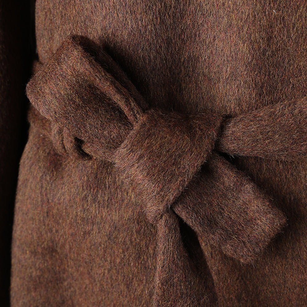 Close-up of a brown Wool Jacket featuring a stylish belt detail for added elegance