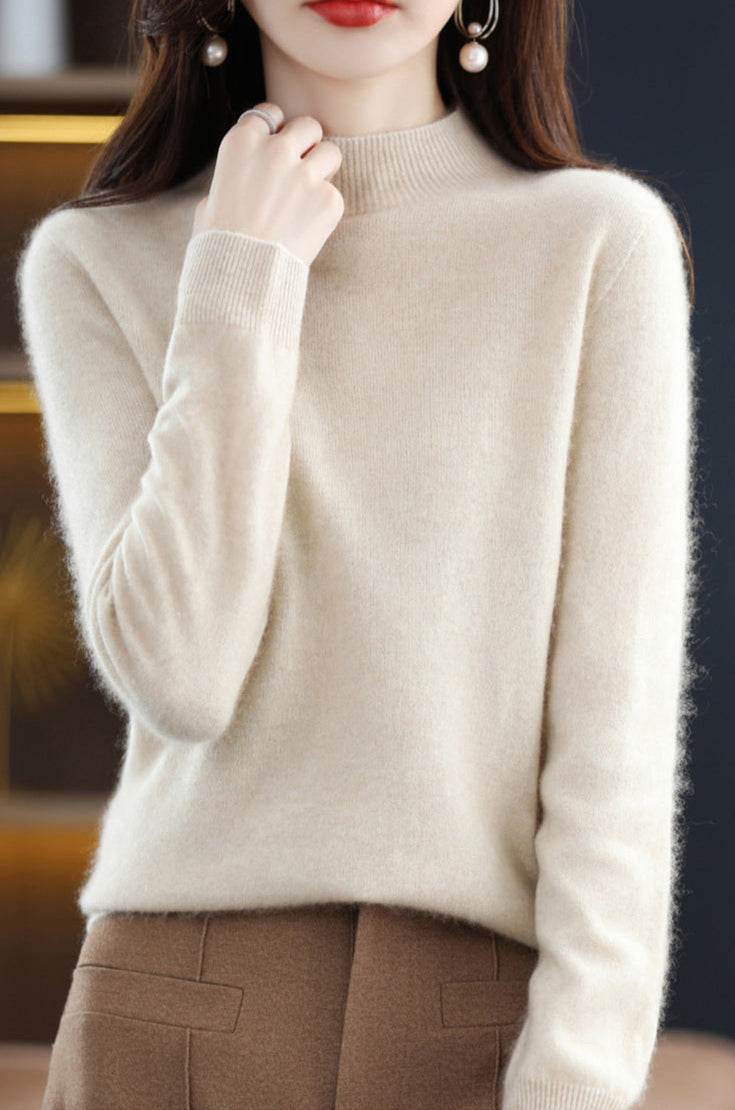 Soft Cream Wool Sweater with a Cozy Fit and Elegant High Neck Design